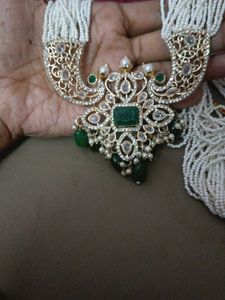 Elegant White pearl Necklace with Emerald Pendant