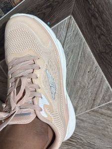 peach color sneakers