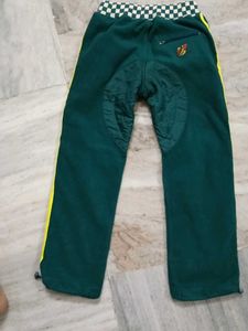 Green Track Pants with Yellow Stripes