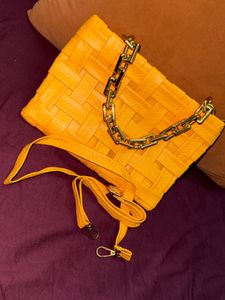 Vibrant Yellow Woven Clutch with Chain Strap