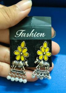 Two Designer Jhumka Earrings &amp; One earring free