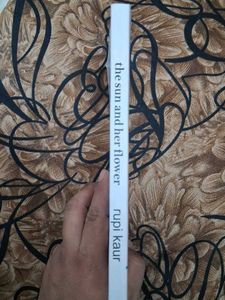 The Sun and Her Flowers by Rupi Kaur