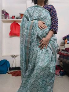 Elegant Green Saree with White Leaf Print