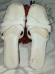 White patent criss-cross flats