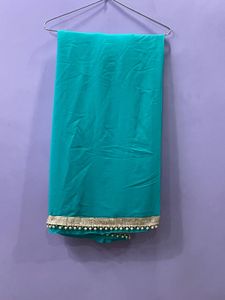 Teal Saree with Pearl Detailing