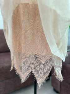 Elegant Pleated Midi Skirt with Lace Trim
