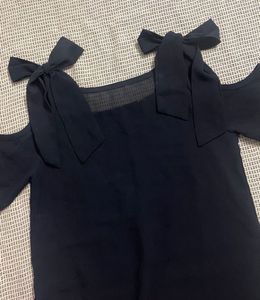 Chic Black Cold Shoulder Top with Bow Accents