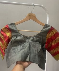 Elegant Grey Blouse with Red & Gold Sleeves