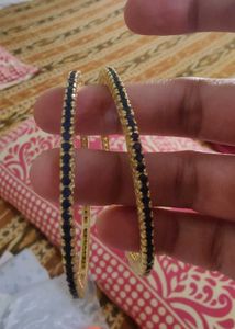 Elegant Gold Bangles with Blue Stones