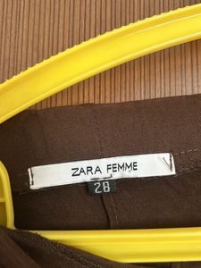 Strechable Brown With Zip And Slit At The Back Sk