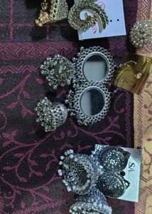 3 earrings or 1 ring