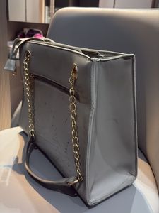 Chic Quilted Grey Handbag with Gold Chain