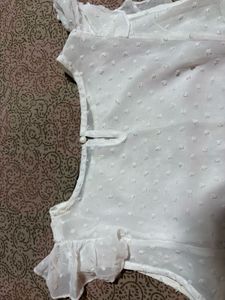 Embroidered White Peplum Top