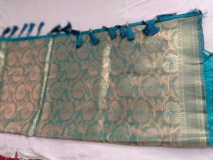 Elegant Teal and Gold Brocade Saree