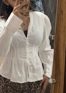 Chic White Button-Up Peplum Top