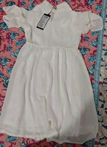 Chic White Mini Dress with Ruffle Sleeves