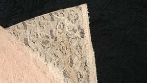 Elegant black, orange, cream net fabric