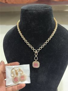 Brand new Pink Stone Necklace and Earrings Set