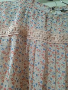 Flower themed peach top