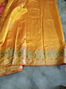 Elegant Orange Silk Saree with Floral Border