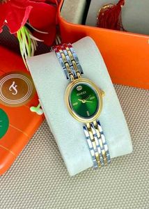Gucci Gold &amp; Green Watch