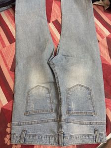 Light Wash Distressed Denim Jeans