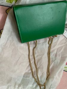 Green Crossbody Bag with Gold Chain.