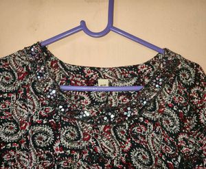 Elegant Printed Kurta with Embellished Neckline