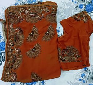 Elegant rust brownish touch saree