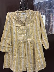 Stylish Yellow Printed Kurti