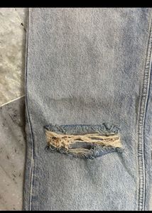Distressed Light Wash Denim Jeans