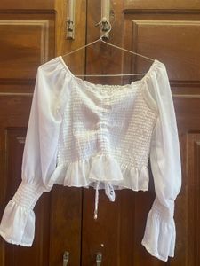 Chic White Smocked Blouse with Bell Sleeves