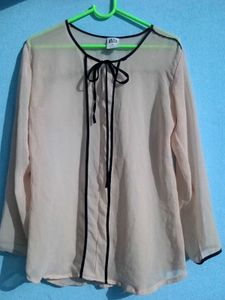 Vero moda Sheer Beige Blouse with Black Trim.