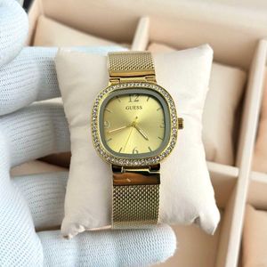 Gold Guess Watch with Crystal Bezel