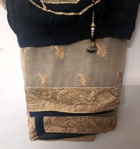 Elegant Embroidered Golden Black Heavy Saree