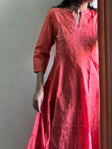Elegant Coral Kurta with Intricate Print