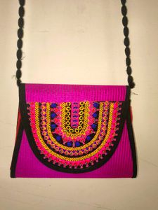 Vibrant Embroidered pink sling Bag