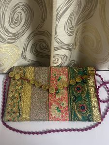 Embroidered Clutch with Coin Embellishments