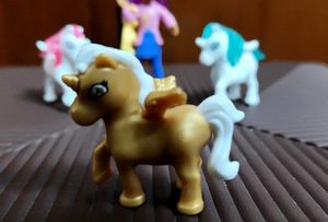 seto of 4 kinder Joy Unicorn Toy Figures