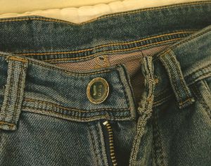 Worn Blue Denim Jeans