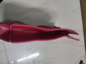 Red Wanderlust Clutch Bag . nykaa leather ba
