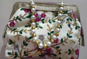Embroidered Clutch with Pearl Handle