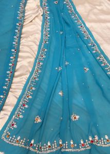 Turquoise Embroidered Saree