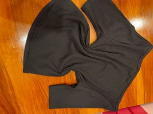 Black Ribbed top with puffer jacket