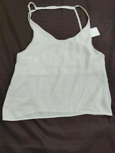 White camisole with beaded detail
