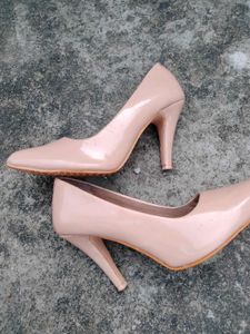 Elegant Nude Patent Leather Stilettos
