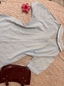 Blue top with White Trim