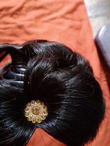 Elegant Hair Bun with Embellishments