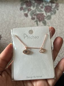 Evil eye rose gold necklace