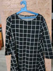 SHEIN Black checkered A-line dress.